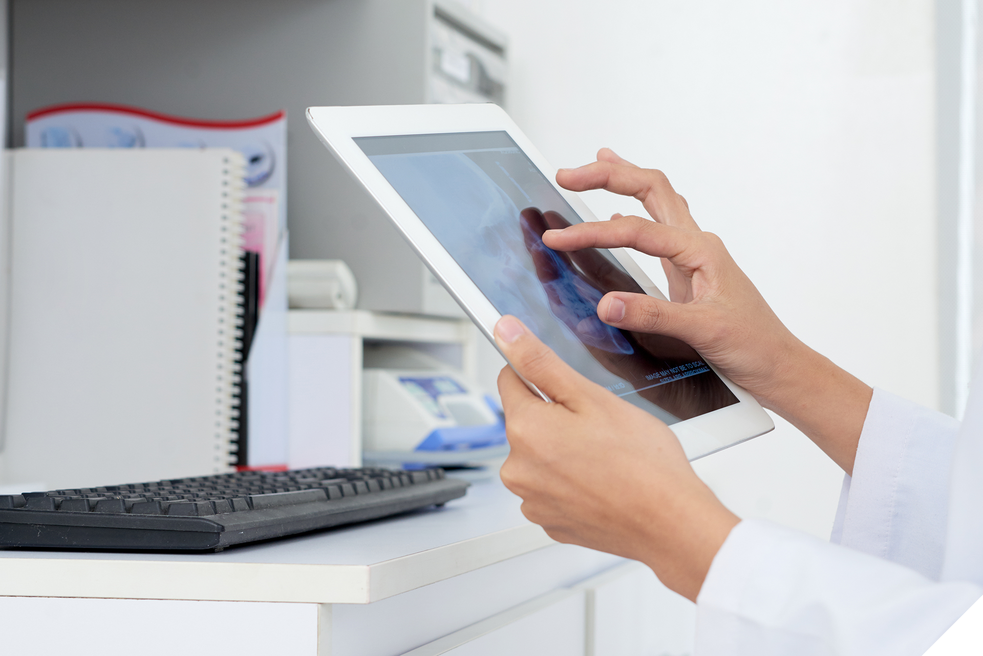 tablet in hand