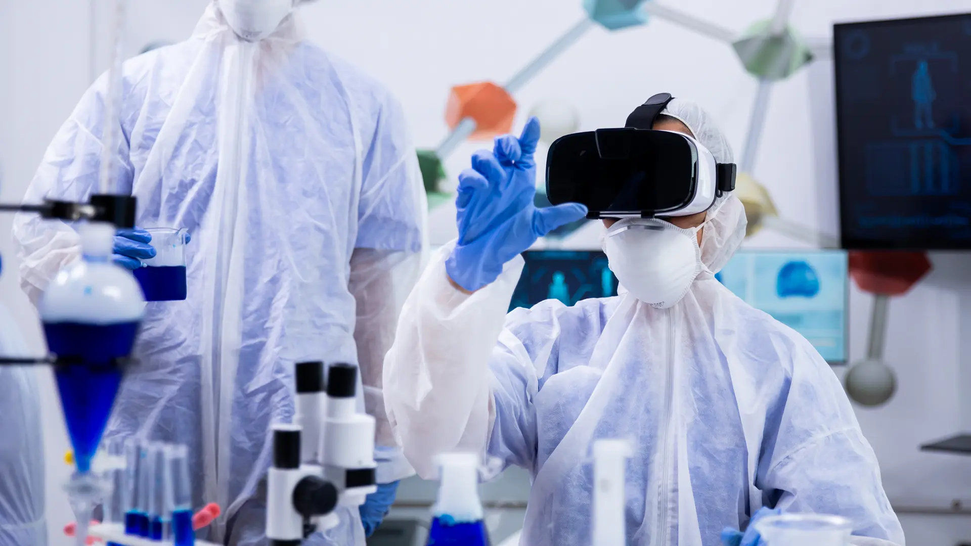 Biotech scientist wearing VR headset