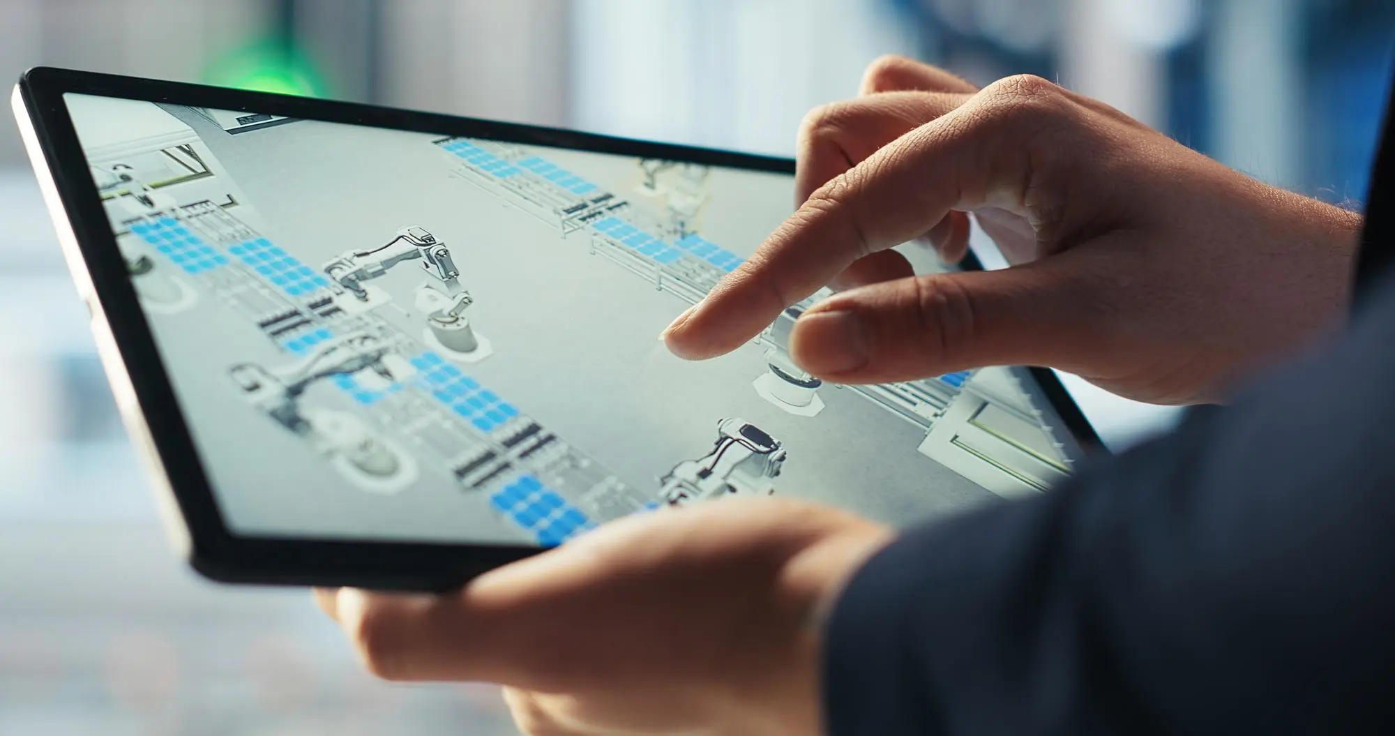 Tablet displaying real-time machine performance data via a secure IT/OT integration interface